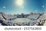 Blurred background of capturing a wide angle view of a tennis stadium during a major event, showcasing the energetic atmosphere and enthusiastic crowd under a bright sky.