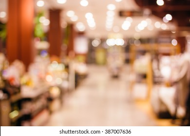 Blurred Background Of Colorful And Freshness Modern Retail , Department Store Or Shopping Mall With Natural Bokeh Light. For Your Outstanding Retail Background And Business Project Design.
