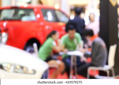 Blurred Background Consultants Are Individuals Buying Car