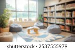 Blurred background of a cozy reading corner in a classroom, featuring comfy bean bags and shelves filled with books, creating an inviting space for learning and relaxation.