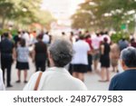 blurred for background. Crowd of people on the street. people walking on the city street. A blurry people walking. Urban, social concept. Abstract urban background with blurred buildings and street.	
