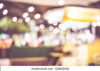 Blurred background, Customer shopping at supermarket store with bokeh light
