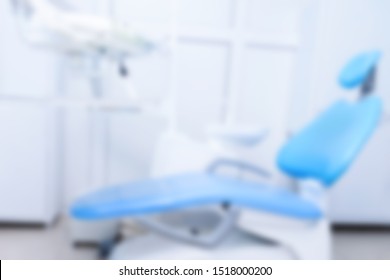 Blurred Background Of Dentist Dental Cabinet In A Clinic With Chair