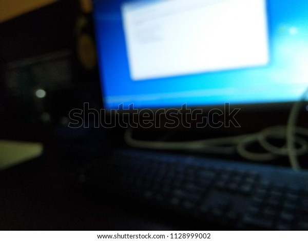 Blurred Background of\
Desktop computer