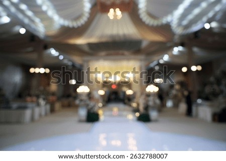 Blurred background Elegant Wedding Reception Venue with Soft Lighting
