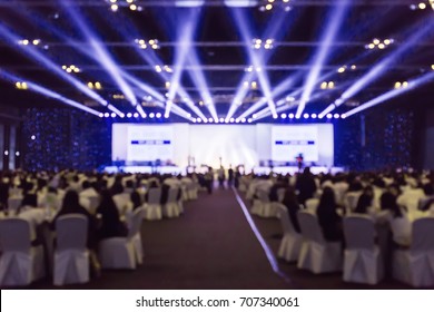 blurred background of event concert charity, blur of light on stage - Shutterstock ID 707340061
