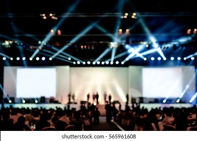 Blurred Background Of Event Concert Lighting At Conference Hall, Spotlight With Laser Rays