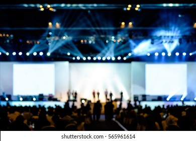 Blurred Background Of Event Concert Lighting At Conference Hall