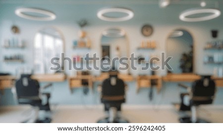 Blurred background of explore this modern salon interior featuring stylish chairs, bright mirrors, and organized shelves of hair products, creating a welcoming and professional space for clients.