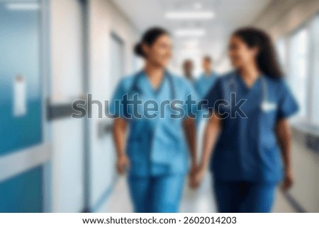 blurred for background. blurred figures of doctors and nurses in a hospital corridor. Doctors and nurses walking in hospital hallway. blurred motion. Moving human figure in the clinic corridor
