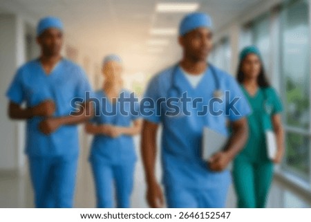 blurred for background. blurred figures of doctors and nurses in a hospital corridor. Doctors and nurses walking in hospital hallway. blurred motion. Moving human figure in the clinic corridor