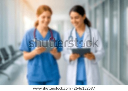 blurred for background. blurred figures of doctors and nurses in a hospital corridor. Doctors and nurses walking in hospital hallway. blurred motion. Moving human figure in the clinic corridor