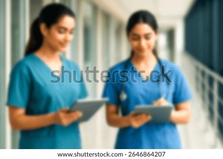 blurred for background. blurred figures of doctors and nurses in a hospital corridor. Doctors and nurses walking in hospital hallway. blurred motion. Moving human figure in the clinic corridor
