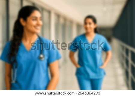 blurred for background. blurred figures of doctors and nurses in a hospital corridor. Doctors and nurses walking in hospital hallway. blurred motion. Moving human figure in the clinic corridor
