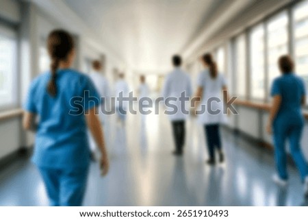 blurred for background. blurred figures of doctors and nurses in a hospital corridor. Doctors and nurses walking in hospital hallway. blurred motion. Moving human figure in the clinic corridor