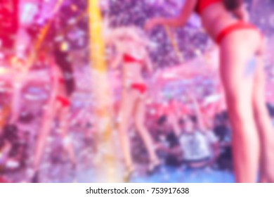 Blurred For Background. Go Go Dancer. Dance Show At Night Club. Performance Show During Night Party.