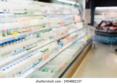 Blurred background of groceries on counters in store