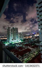 Blurred Background Of High-angle City Views, Visible Light From Traffic And Lights From Houses And Moving Clouds