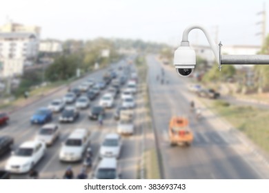Blurred background of intersection traffic car jams in the rush hour city. Soft focus urban transportation scene high angle shots on road highway.