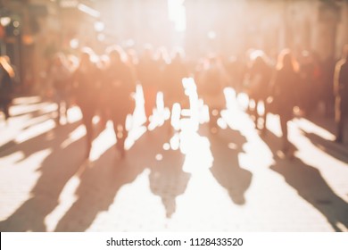 Blurred Background Made Of People Walking Through The City