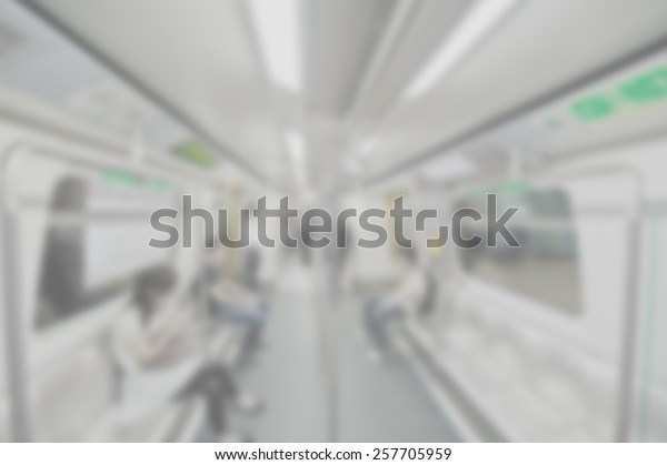 Blurred background of metro carriage
interior. Suitable  as a background for most text colors including
white. Artistic intent with filters and
desaturation.