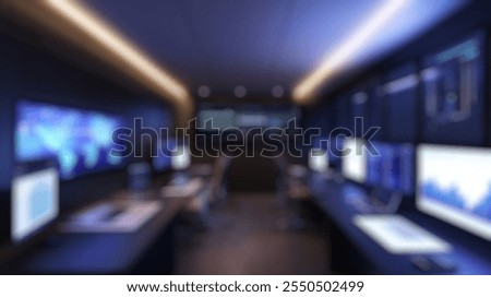 Blurred background of modern command center featuring multiple screens displaying data analytics and graphs, perfect for a high-tech office environment focused on technology and productivity.