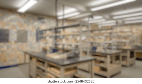 Blurred background of modern craft workshop interior featuring organized workstations, tools, and colorful tile walls for artisans and creatives in a spacious environment - Powered by Shutterstock