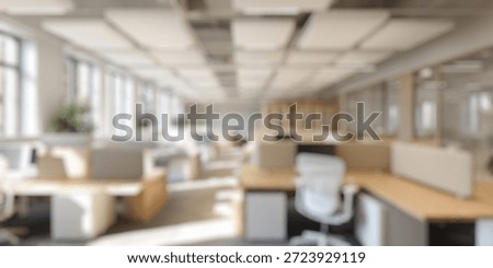 Blurred Background of Modern and Spacious Open Office Design with Natural Light, Ergonomic Furniture, and Collaborative Workspaces for a Productive Environment