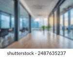 blurred for background. office building interior, empty hall in the modern office building. empty open space office. panoramic windows and beautiful lighting	
