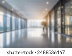 blurred for background. office building interior, empty hall in the modern office building. empty open space office. panoramic windows and beautiful lighting