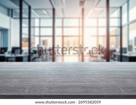 Blurred background of office with table in the foreground.