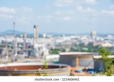 Blurred Background Oil Refinery Gas Petrol Plant Industry Crude Tank, Chemical Factory. Blurry Background Copy Space Of Petroleum Barrel Fuel Oil Refinery Abstract Defocused For Web Banner Template