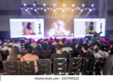 Blurred background of panel on Stage during Discussion Event. Successful Executives and Entrepreneur Speakers and Presenters in Conference Hall Lecture Series.