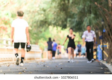 Blurred background of people activities in park , spring and summer season. - Shutterstock ID 1027806511