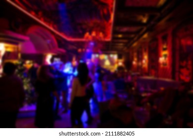 blurred background people in the bar - Powered by Shutterstock