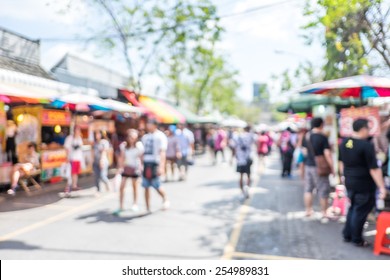 Blurred background : people shopping at market fair in sunny day, blur background with bokeh - Shutterstock ID 254989831