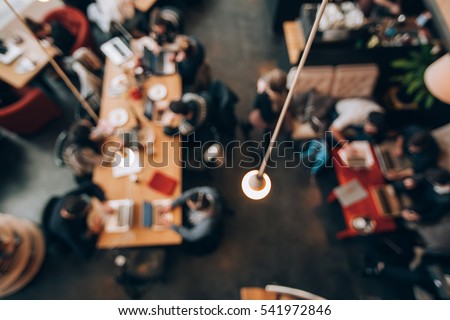 Blurred background of perfect co working space for students and freelancers. Top view.