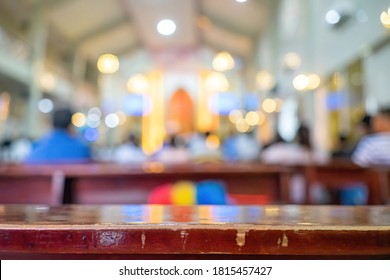 A Blurred Background Photo Of The Inside Of A Vietnamese Church Sanctuary That Is Filled With People In The Pews, And The Pastor Stands Under A Large Cross At The Altar, In Vietnam. Selective Focus.