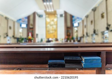 A Blurred Background Photo Of The Inside Of A Vietnamese Church Sanctuary That Is Filled With People In The Pews, And The Pastor Stands Under A Large Cross At The Altar, In Vietnam. Selective Focus.