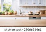 Blurred background of the photo. A modern kitchen interior with a wooden table.