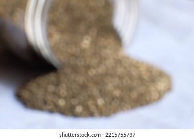 Blurred Background Of Pile Of Scattered Chia Seeds