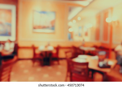 Blurred background of restaurant.