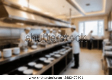 Blurred background a restaurant kitchen worker is working washing dishes after being used by customers.
