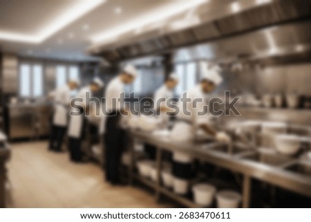 Blurred background a restaurant kitchen worker is working washing dishes after being used by customers.