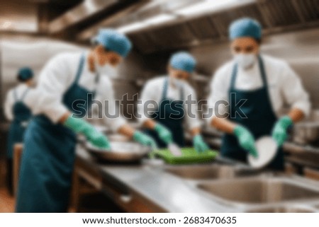 Blurred background a restaurant kitchen worker is working washing dishes after being used by customers.
