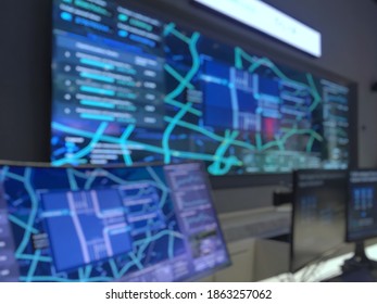 Blurred Background Of Road Traffic System Display In Control Room.