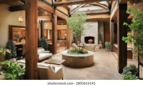Blurred background of a rustic atrium featuring exposed wood beams and lush greenery creates a cozy, inviting atmosphere. perfect for relaxation and gatherings.