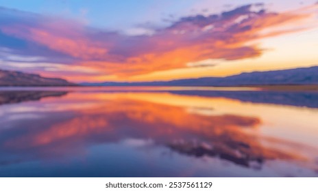 Blurred background of serene beauty of a vibrant sunset reflecting on a calm lake, showcasing a stunning blend of colors in the evening sky. perfect for tranquil scenery. - Powered by Shutterstock