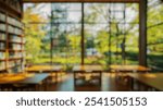 Blurred background of a serene library setting features large windows that offer a tranquil view of nature, creating a peaceful atmosphere ideal for reading and study.