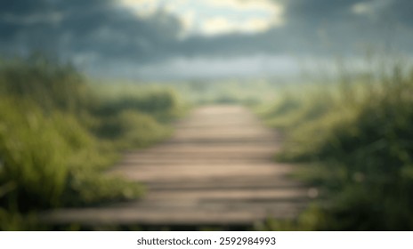 Blurred background of serene pathway through lush green grass under dramatic cloudy sky at dusk, inviting nature's tranquility and peaceful reflection in a beautiful landscape